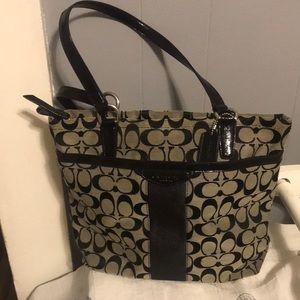Coach purse with matching wristlet.